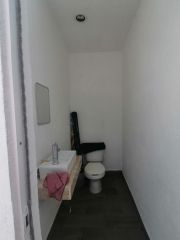 {"esp":"MEDIO BA\u00d1O EN ROOF GARDEN","ing":""}